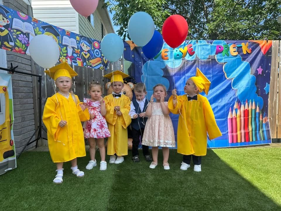 Children in graduation caps and gowns at Sunny Bunny Daycare Barrie