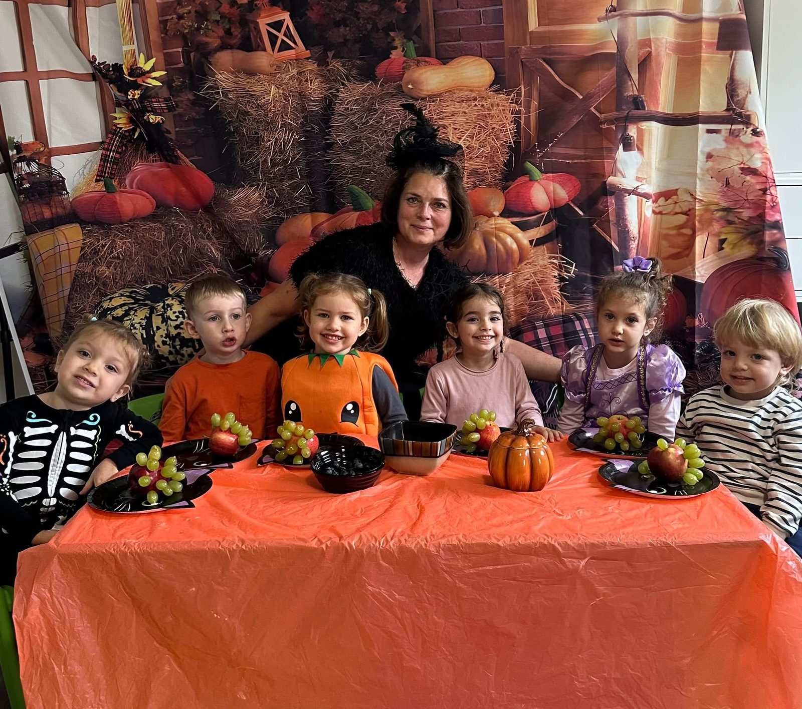 Halloween celebration with children and teacher