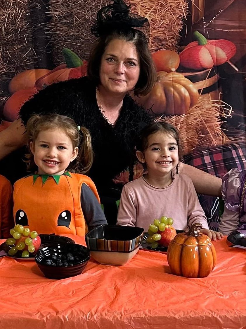 Inna Vasileva, caregiver and teacher at Sunny Bunny Daycare in Barrie, with two children