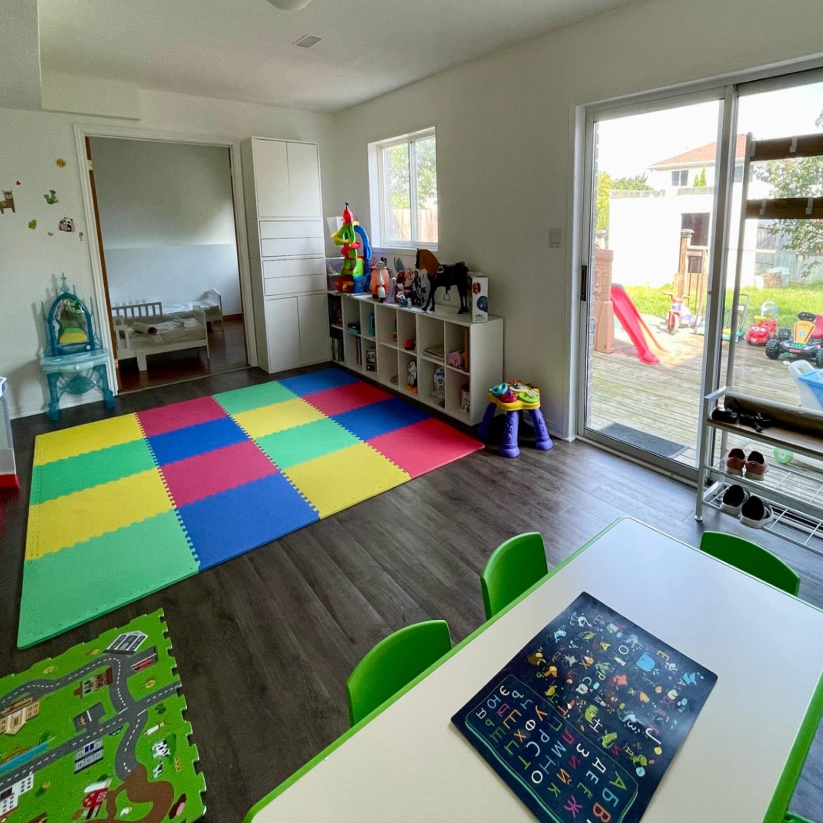 Bright sunny playroom at Sunny Bunny Daycare in Barrie with toys and learning space